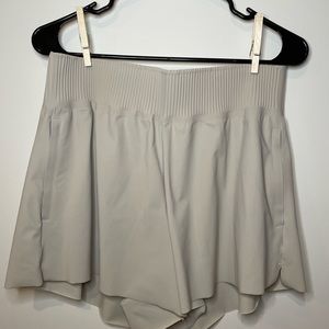Cosmic flutter shorts, Athleta, cream, zipped pockets, size small